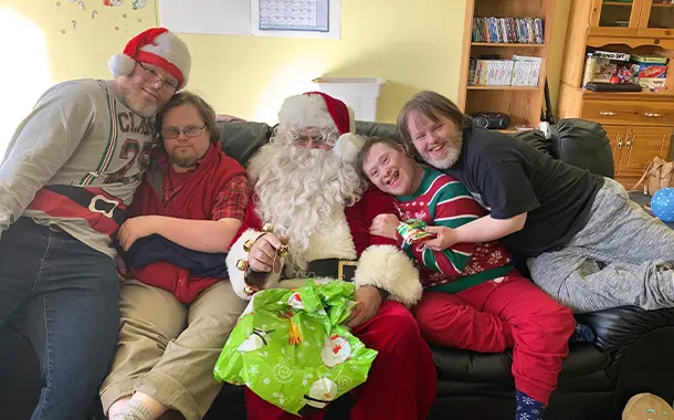 Group sitting with Santa